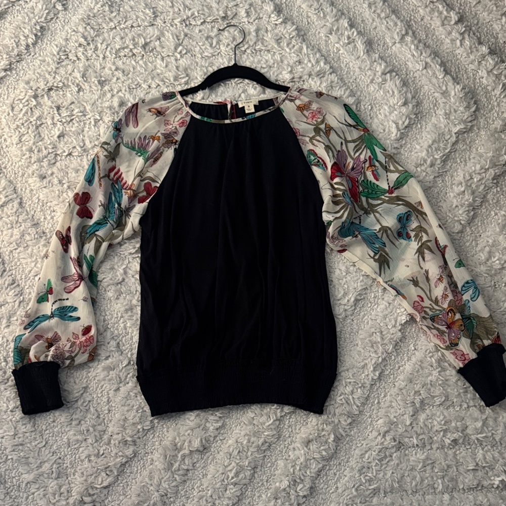 Chic Black Top with Floral Sleeves
